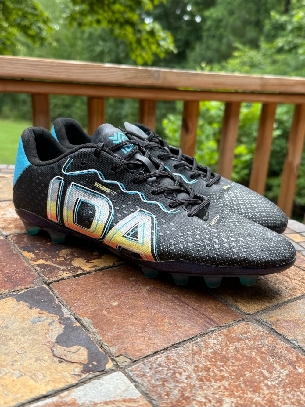 IDA Soccer Cleats in Black with Teal & Yellow Accent